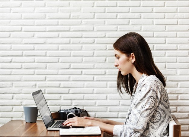 Woman journalist writing