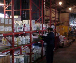 A worker takes inventory at the Hazardous Material Control Center. The HMCC, located on Michael Street, reissues serviceable hazardous materials back to various units instead of being disposed of as hazardous waste. (photo courtesy of the Hazardous Material Control Center)