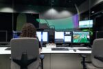 Airport Technology. Female Engineer Controlling Flight Simulator. Science, Simulation, Software, Technology.