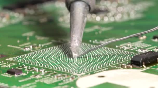 Reballing Grid Array Solder Balls Under an Integrated Circuit Chip in the Printed Circuit Board
