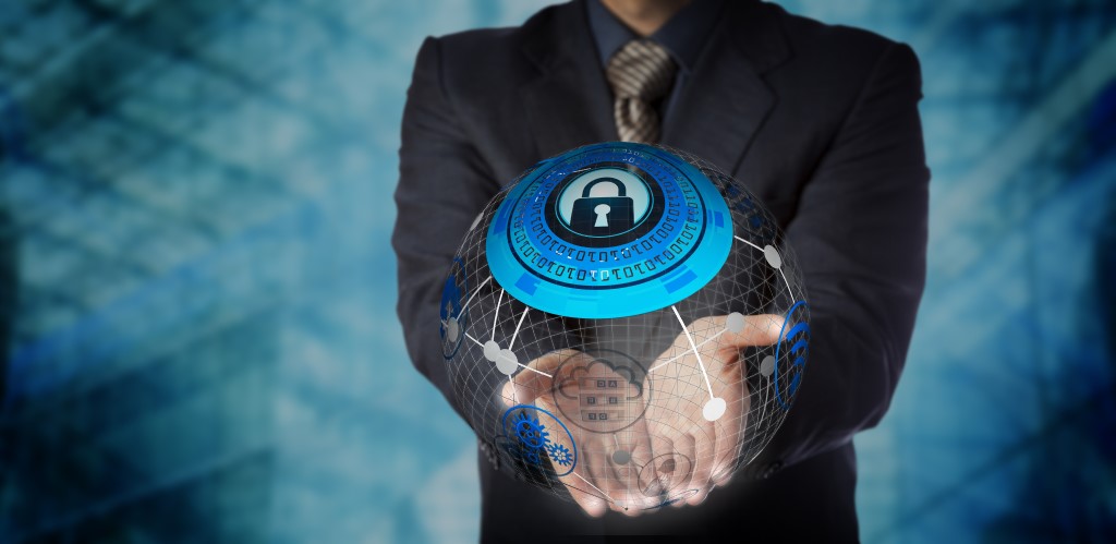Man Offering Secure Managed Data Storage Services. IT concept for data storage, cloud computing, mobility management, global communications, security technology and computer network.