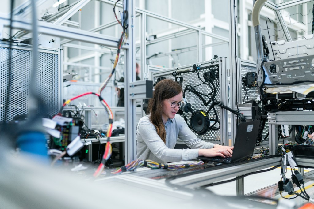 Female electronics engineer runs vehicle tests