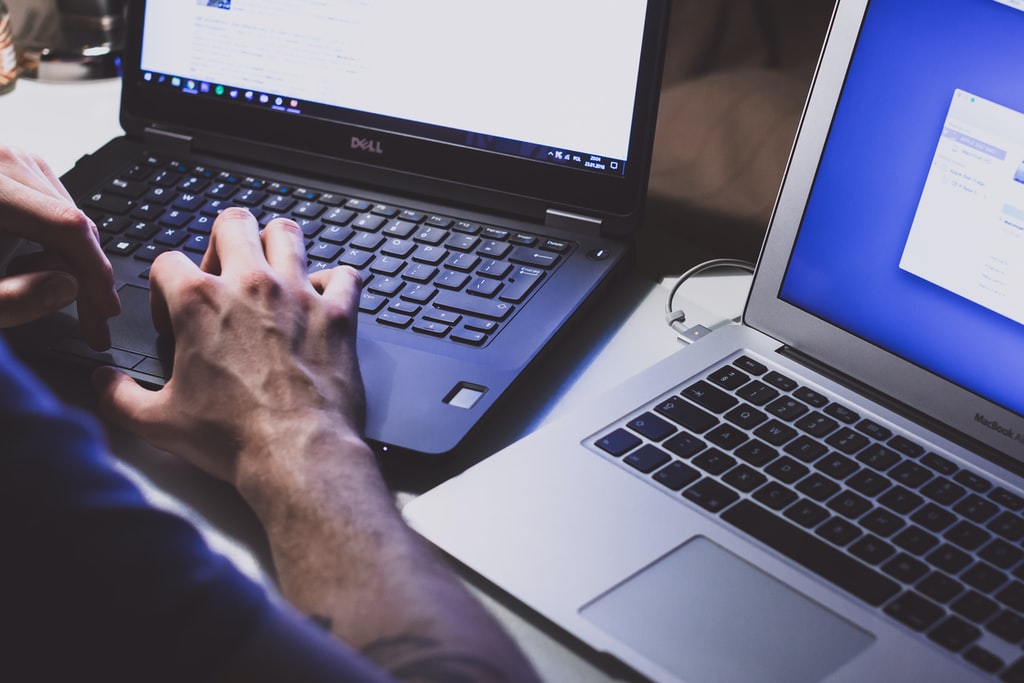 Person Using Black Laptop Computer Photo