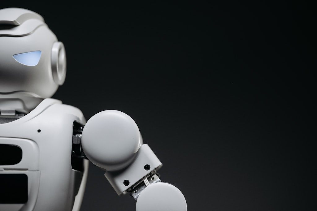 Grayscale Photo of a Futuristic Robot