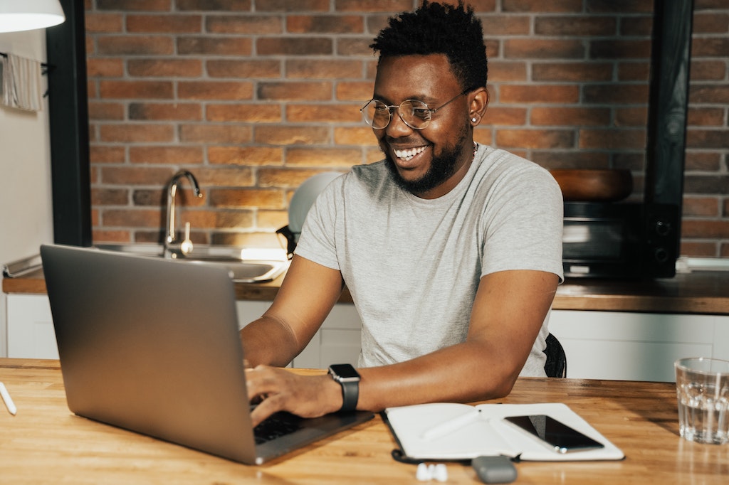 Man Using a Laptop, BAS Agent