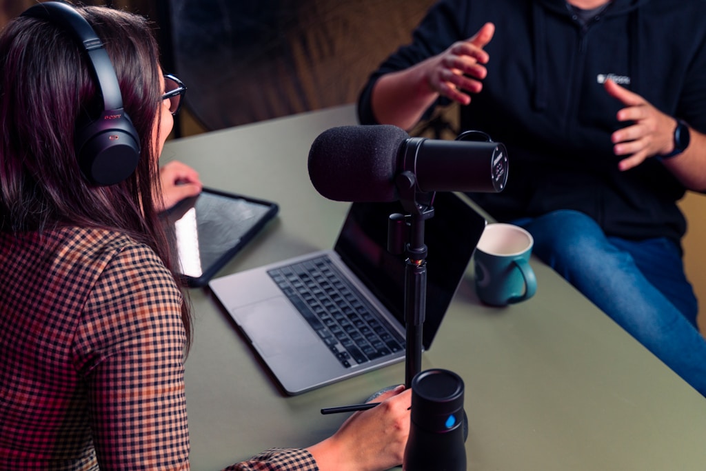 Podcast host and guest having a discussion.