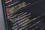Software escrow shields your source code from risk, WordPress responsive theme source code displayed on this photo